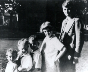 Charlie in the middle with his sisters and brothers.